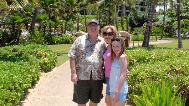 The Harksen's in Kauai at a Luau.