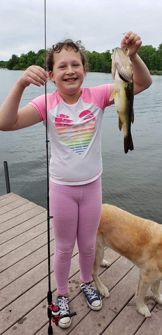 At the cabin with my grandkids and my oldest just caught a really big bass.