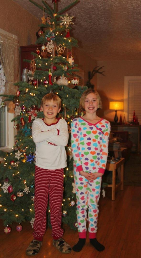 The children were supposed to be nestled all snug in their beds while the aftershock of the afternoons sugar and excitement danced in their heads. Good luck with that....