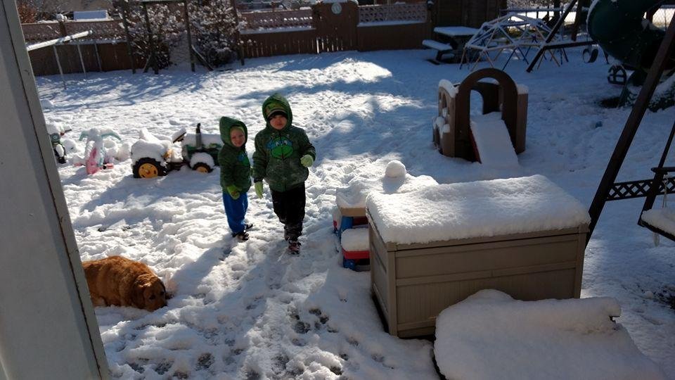 Tyler and Mason playing in the first snowfall of december