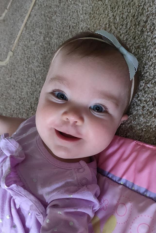 McKinsey is big six months old almost she is growing so fast I love her Big blue eyes