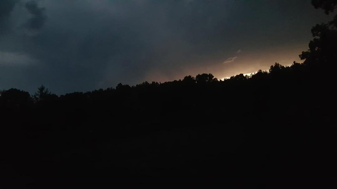 Setten on the porch lookin at the storm what a beautiful even thunder in the distance lighting full moon actively gaining strength. What a spectacular and majestic sight nature at its finest. Have a good evenin everyone..