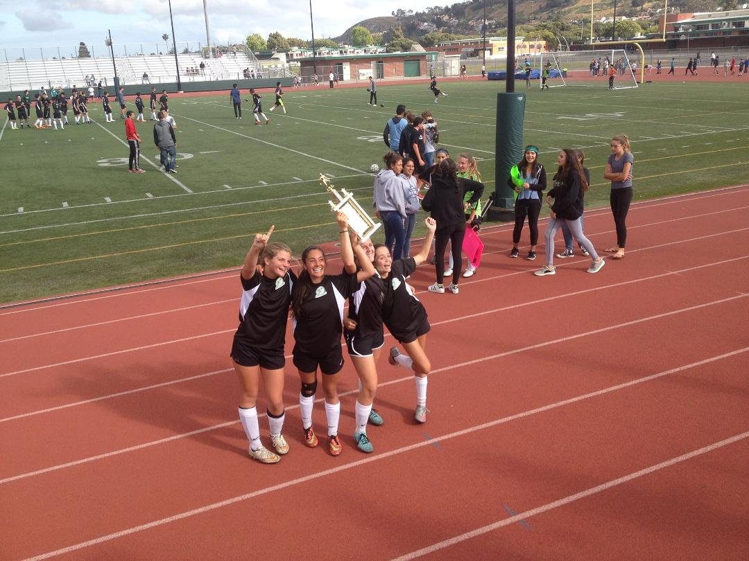 Hailey Austin and Richardson teammates celebrate 3-0 victory over Calle Mayor