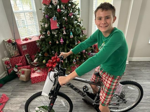 Merry Christmas from the Pattersons!
This is our darling youngest grandson Barney Ghio (11 years old) with his new bike delivered last night by Santa.