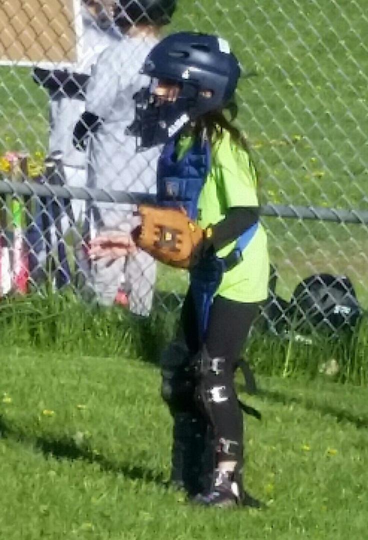 Bella's turn to play catcher - one of the rare days it didn't rain.