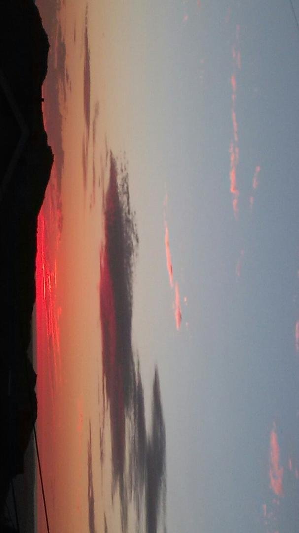 Clouds from the Tropical storm, south west of us, for to nights. Sunset.