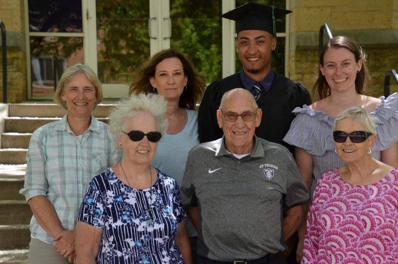 My granson's graduation from St. Thomas Univ. in MN  with my husband, 2 daughters, granddaughter, and sister.