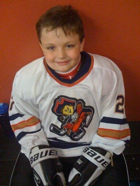 Least I forget, here is the oldest grandson, Christian, all of 8. another hockey player!