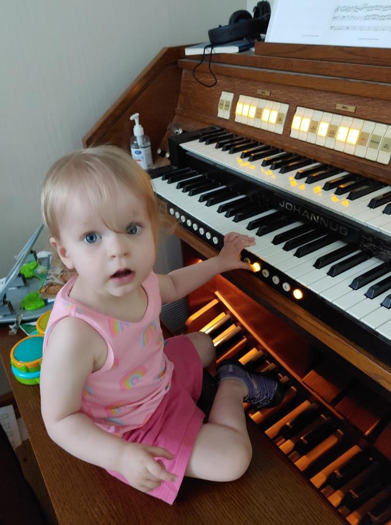 My granddaughter at the mighty Johannus!