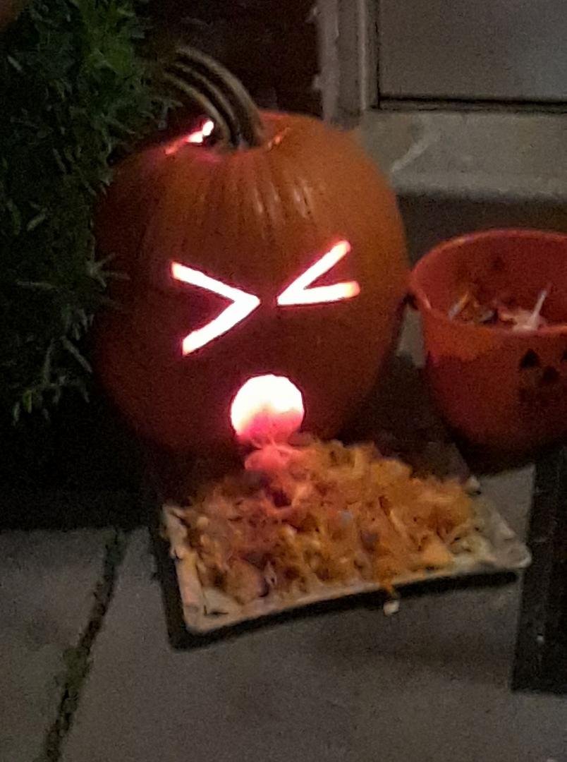 My neighbors barfing pumpkin , must have got some bad totsie pops.