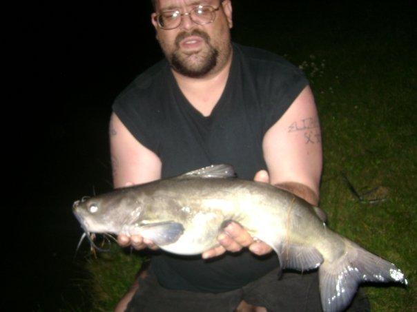 Funny story about this fish. Ellie and I were fishing the pond behind Mom and Dad's house. Ellie got the first big bite. The fish ran and broke her line stealing her hook. About an hour later, this fish grabbed hold and