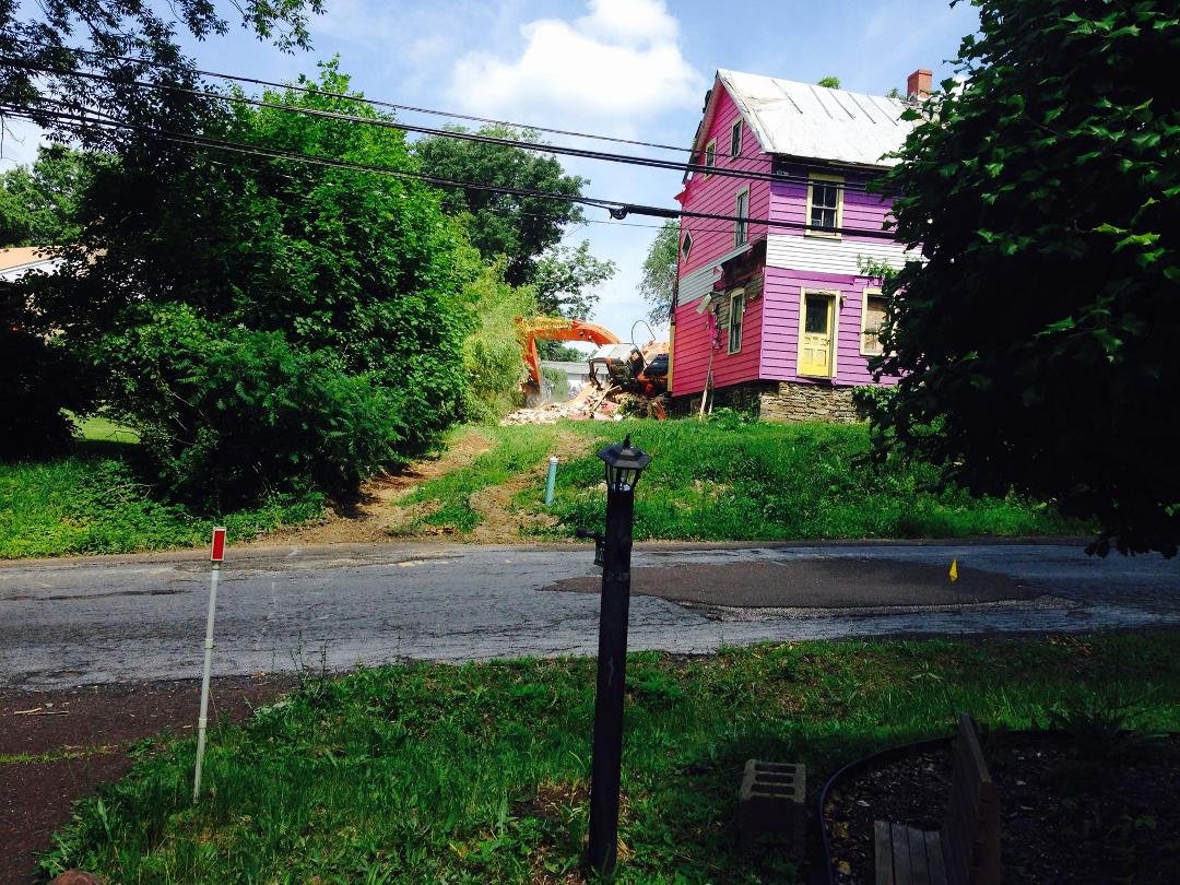 And this is what happened to the bulldozer while tearing the house down.  It fell in its side and needed rescuing