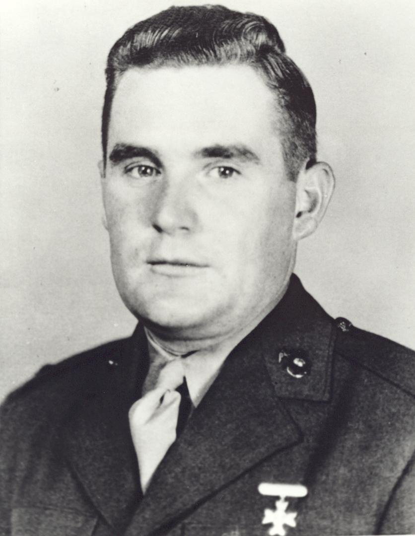 FIRST LIEUTENANT
JOHN VINCENT POWER, USMCR (DECEASED)
Medal of Honor Citation
First Lieutenant Power sailed with his unit in mid-January 1944 from San Diego harbor, and on 1 February, the 24th Marines participated in th