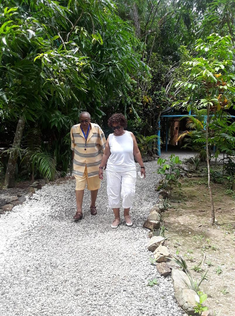 Allen and Gloria walking to the river