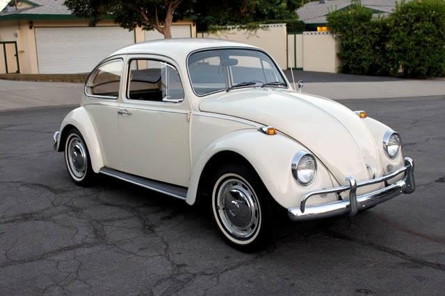 My first car. Beige 1963 VW bug that I bought in 1971. Was also Denise's first car, only her's was a pale yellow.