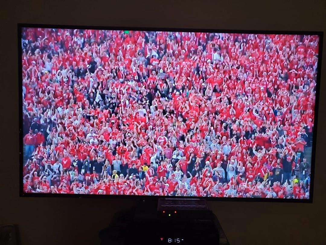 My daughter, Jennifer Baker Henneman, & her husband, Adam Henneman , are at the Rose Bowl, about 11 people from the right & about 7 rows up from the bottom of this picture. He has an Ohio State cap on & she has blonde h