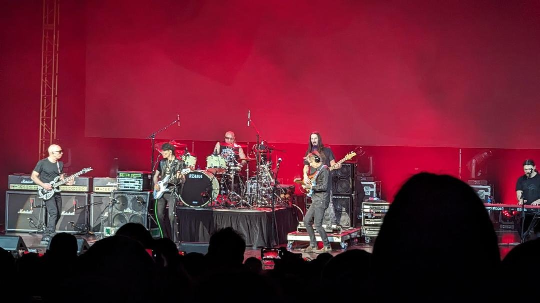 3½ hours of nearly 100 db electric guitar music. 

I don't know if it was the venue or if it's normally that loud, but my eardrums were hurting by the end of the show. It did detract from the ability to enjoy the actual gui