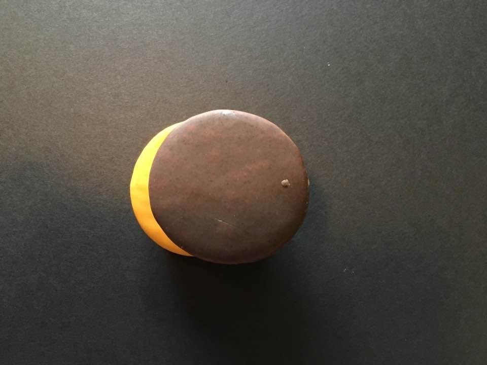 Because of temporary cloud cover, my wife and son Billy simulated the eclipse using actual Moon Pies