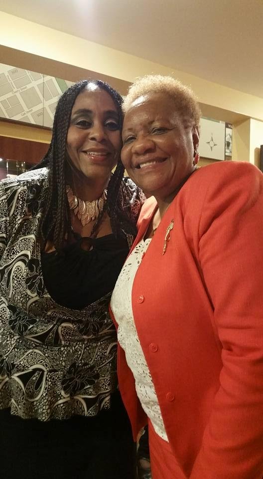 Gina Moore  and Lu Porter enjoying themselves at the Evansville African American Museum Jazzy Night  with Warren Hale.