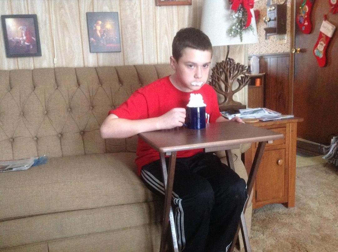 Cameron enjoying his hot chocolate.