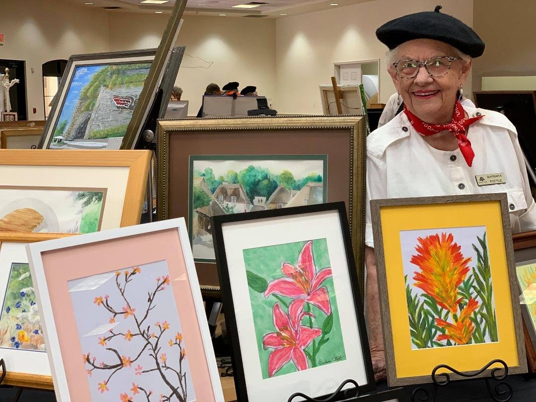 "Celebration of the Arts" event at Royal Oaks last month. Me and my three flower paintings.