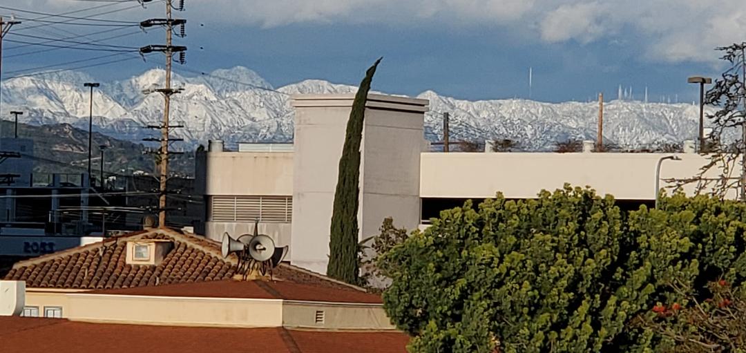 We've never seen this much snow on the San Gabriel mountains! Taken from my balcony.