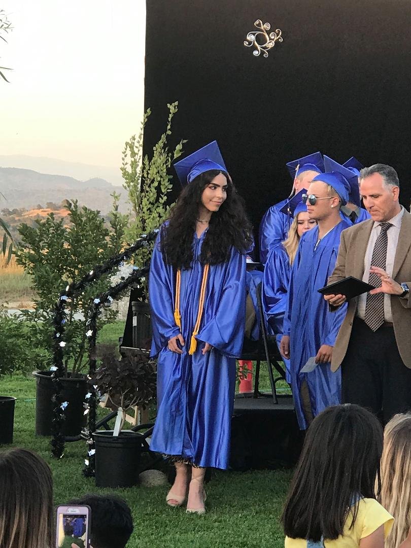 Natalie Zawolkow, my granddaughter, receiving her diploma from high school (with high honors)!
