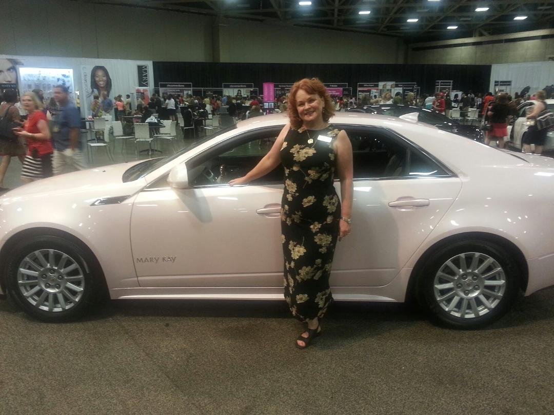 Having fun at the Mary Kay Emerald Seminar.  Who wouldn't have fun driving a car like this?