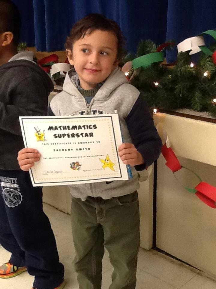 My grandson Zachary.  Math.... really really! What happened to social studies??? He doesn't get math ability from me. It must be from my father.