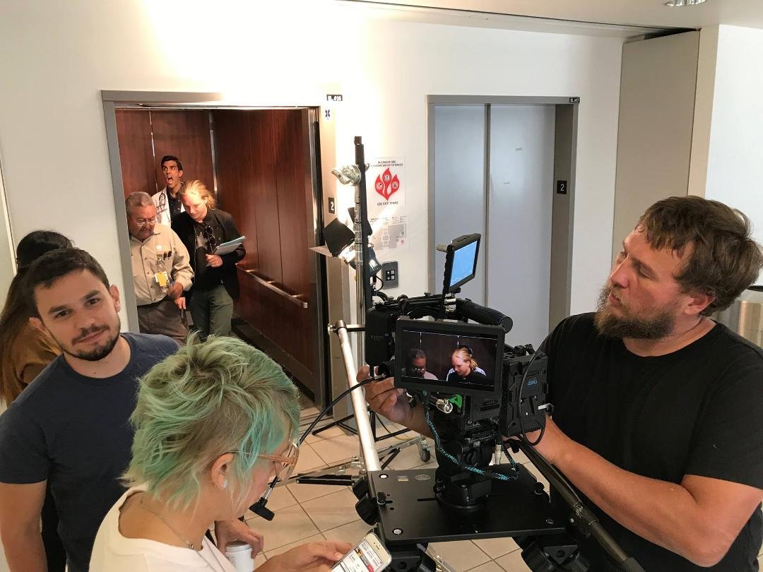 Tamir Gedalia Executive Producer on left, Elevator tech mystery guy shutting down the elevator, screaming face Niko Vitacco the star as Michael, AD Nikita, blue hair AC Tara Zepeda, and DP Samuel Laseke, behind the scenes o