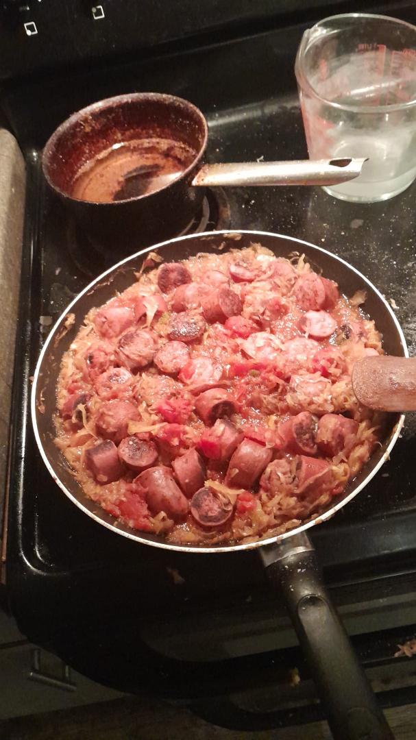 Beef Kilbasa ...sour kraft... stewed tomatoes... a Lil something something ... and love !!!