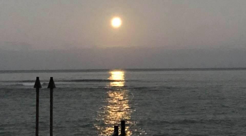 This is what I woke up to this morning. The moon over the channel from out lanai. That’s the last straw. I’m not leaving!