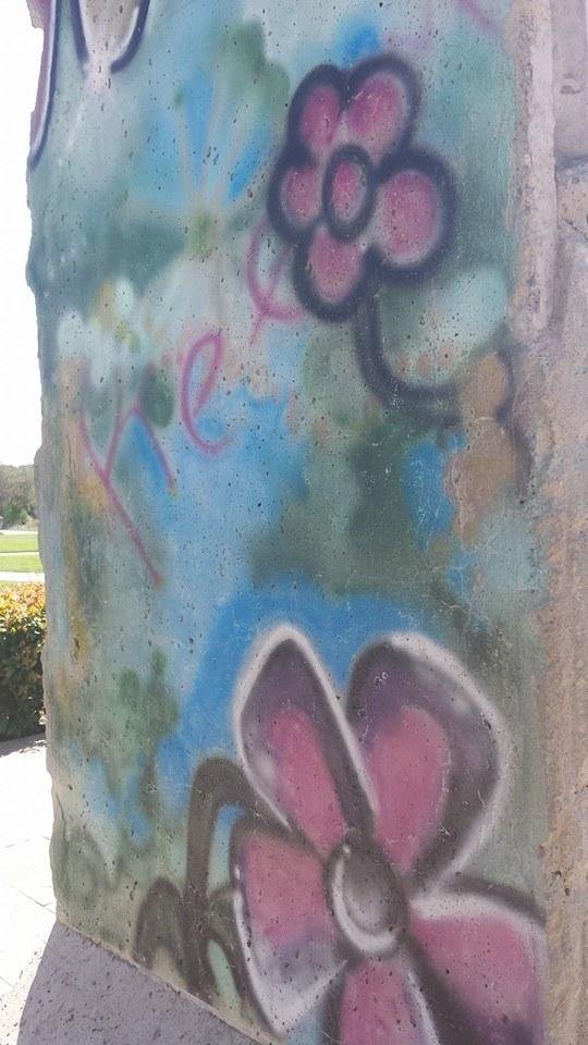 I can't believe I touched the west side of the Berlin Wall! The east side is totally plain.