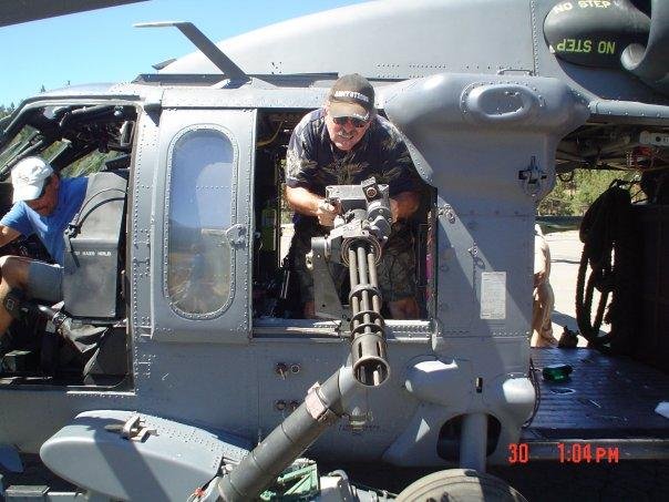 Note: "Army Strong" cap in a Navy HAWK gun ship!!