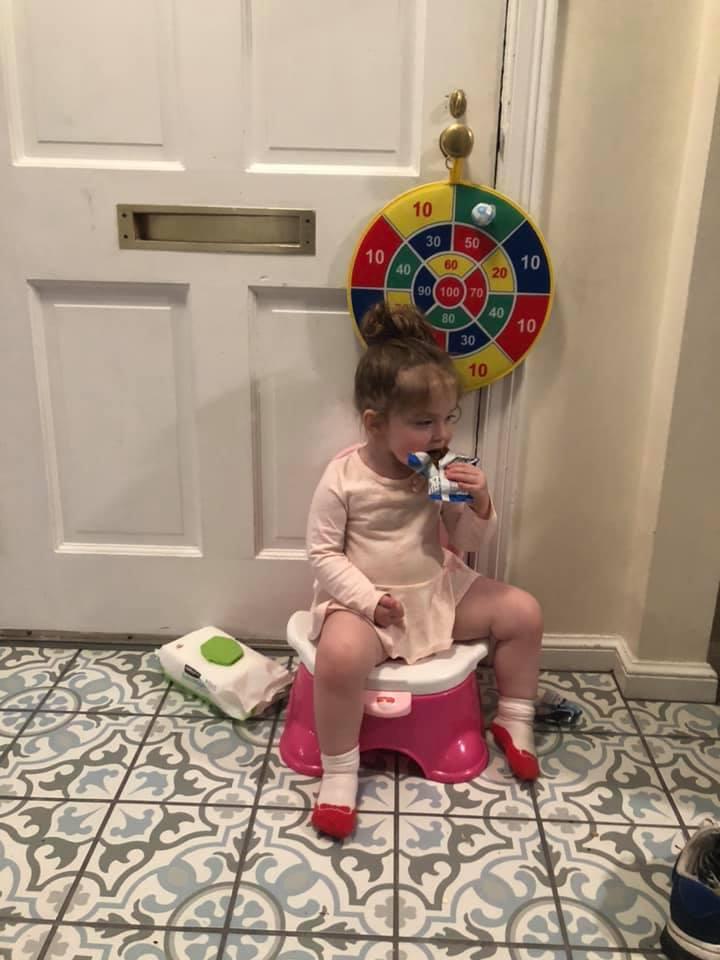 Sure kid, eat on the potty. Wtf do I care?! #loweredbarsofquarantine