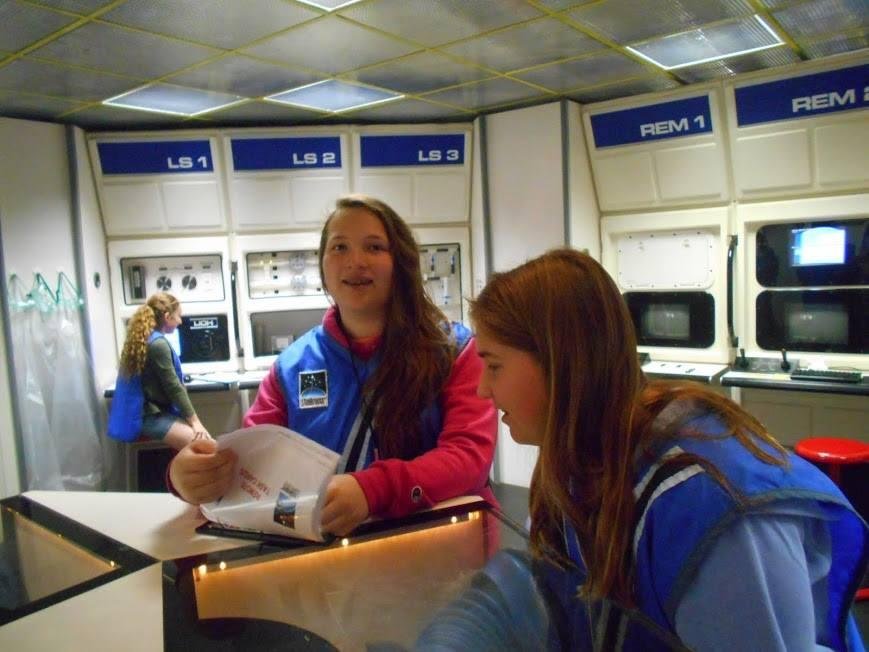 I got the wonderful opportunity to chaperone Lily's class to the Discovery Space and Science Museum. The  Challenger flight simulator took them on a mission to Mars and they were the flight crew.   We all safely landed back