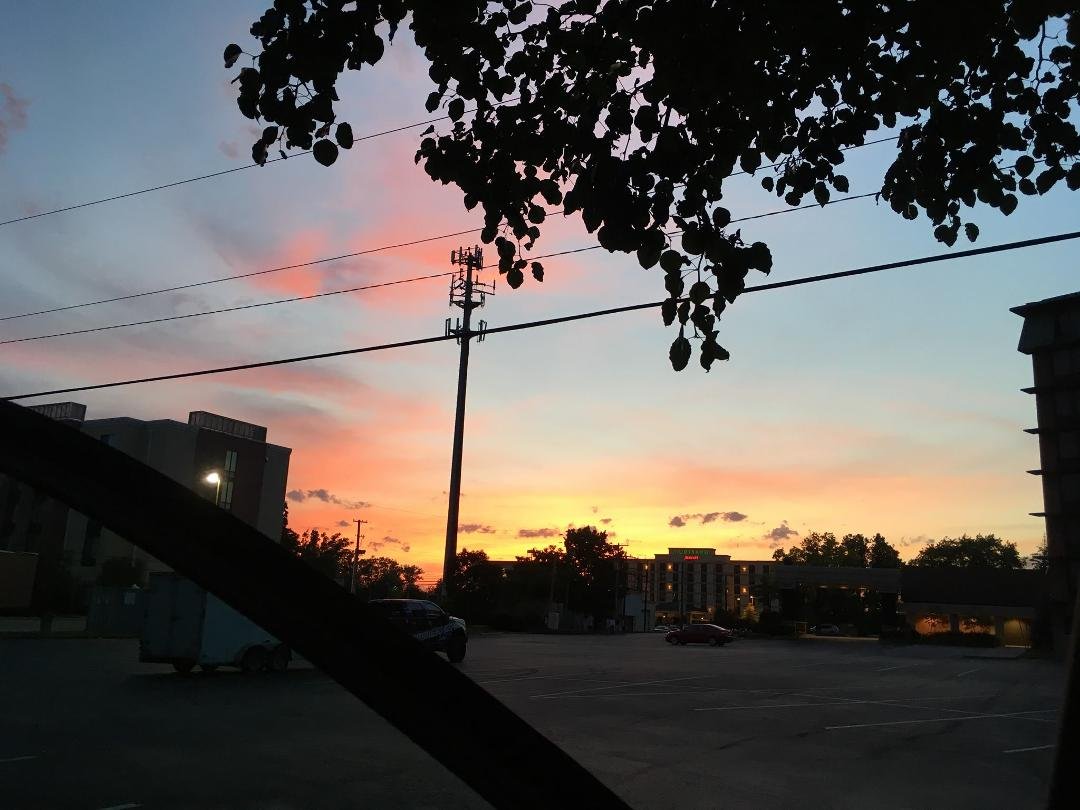 Sunset in Louisville 9:15 PM Wed. Crowne Plaza parking lot.