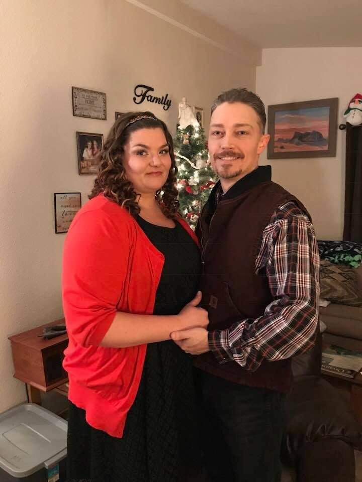 Our baby boy all grown up with his lady on the way to a Christmas work party.