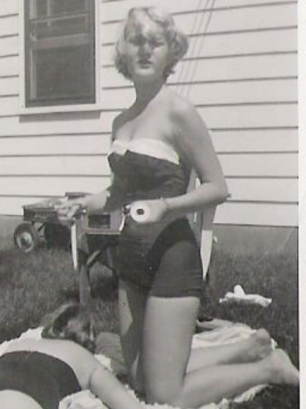 TBT - 1953
Me putting suntan lotion on my sis Carol in our backyard. Carol was 13 and I was 14