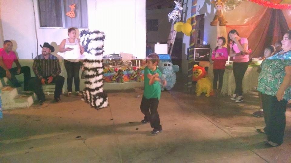 Max taking his turn at the Piñata.