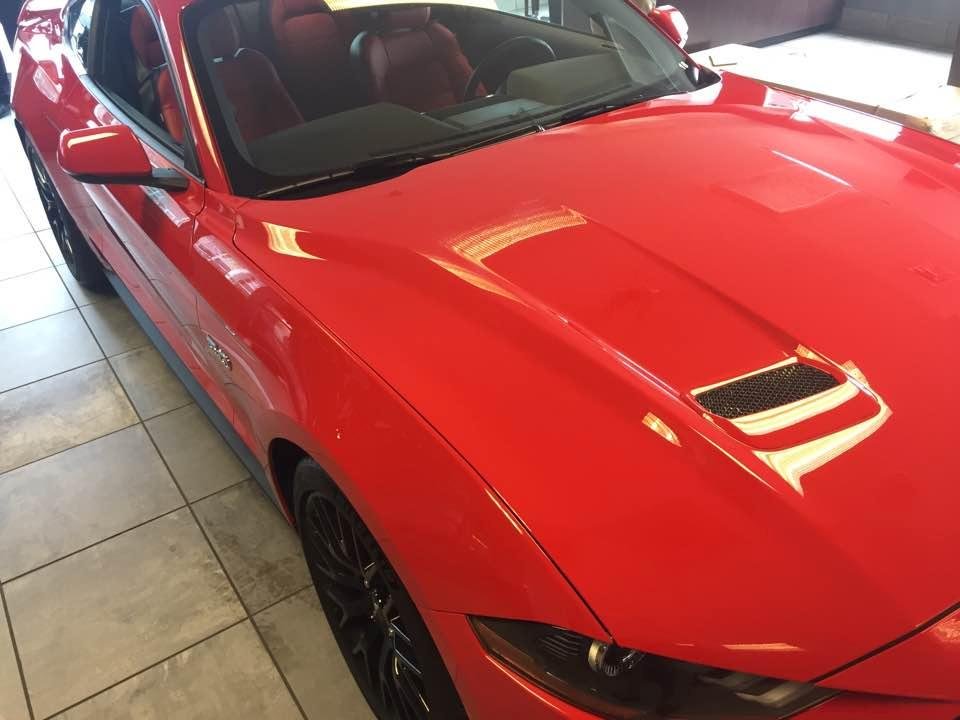 From a design standpoint, my favorite part of the car. You can follow the airflow from the forward edge of the lower body up over the hood as it flows around the A pillars. Functional underhood air-extractors lay flat on th