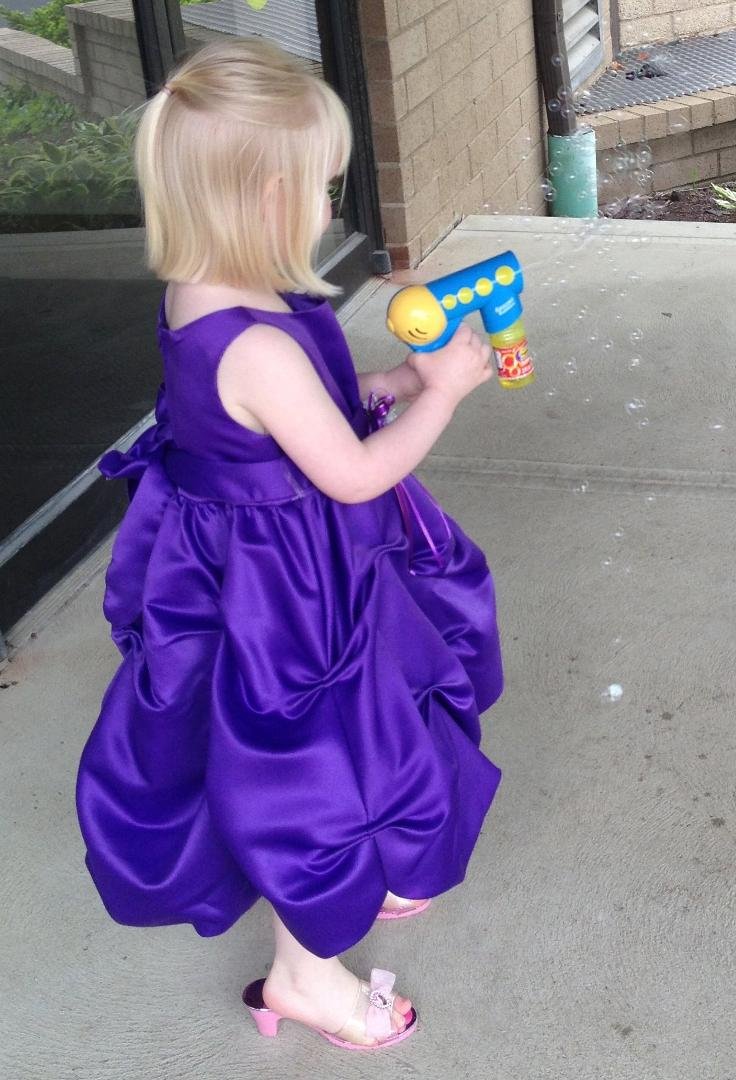 Abby, killing time before the main event. There are those Princess Heels again.