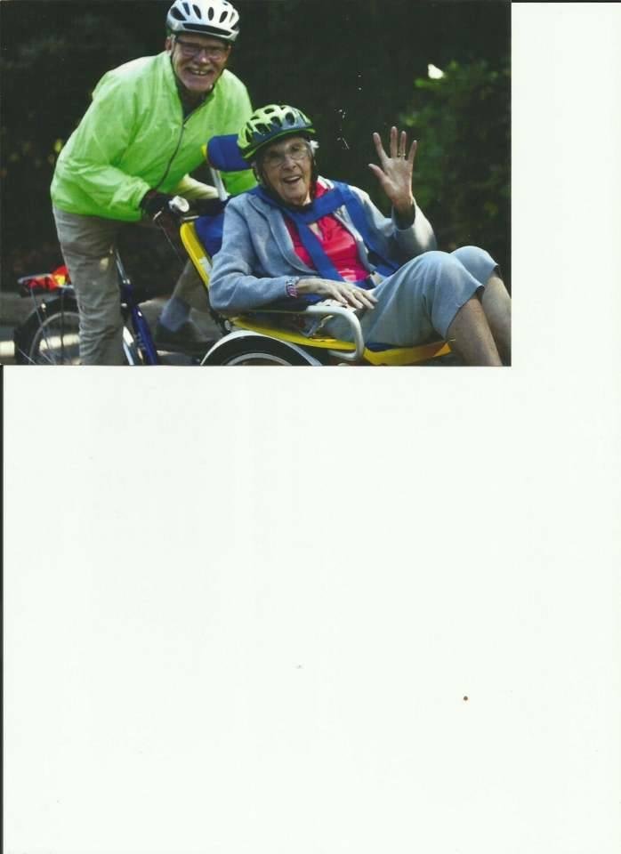 Mary taking a ride to pick up some plants.