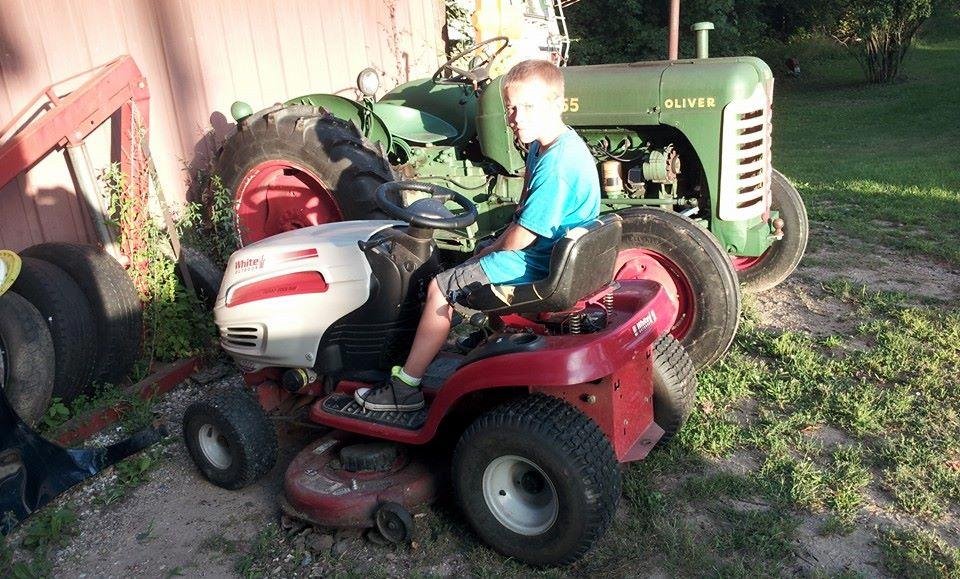 Dylans new mower to help grandpa mow lawn