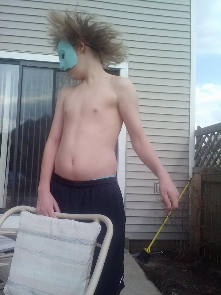 My grandson alex modeling his Claude Raines phantom mask.