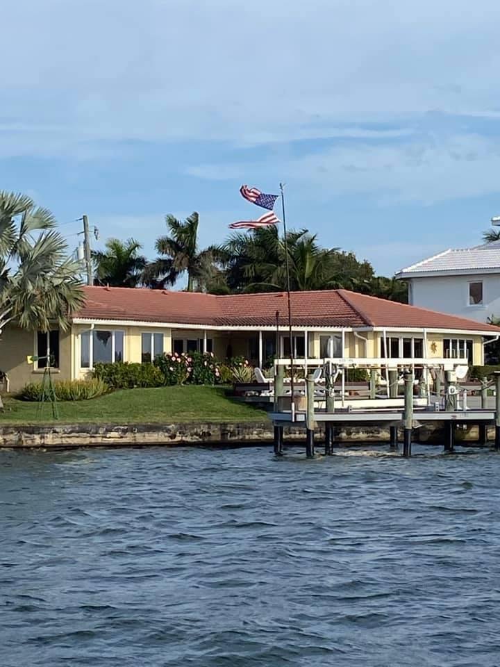 I recently had a nice visit with my friends Ted and Beth Mackey Penesis. We went boating around Siesta Key where we talked politics and government in Illinois, Florida and our country. We saw this home from the boat, with