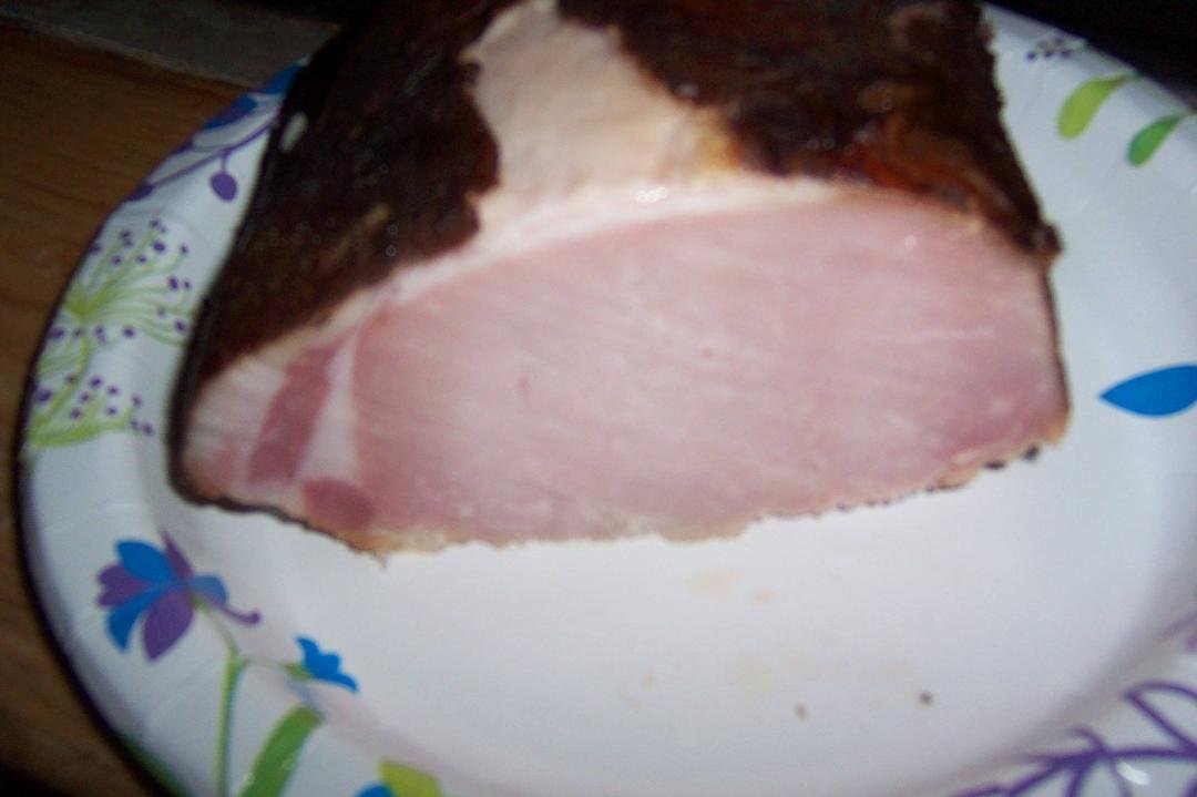 Slicing and frying the bacon. Good even color and texture , small light smoke ring and light smoke flavor , like an old virginia ham.hmmm hmmm. A little dijon mustard on the side.