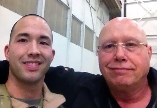 The kid and I in a hanger as he prepares to deploy to Afghanistan at Fort Campbell's main airfield. Couldn't be more proud.