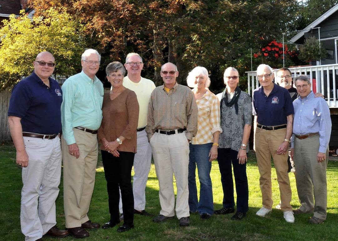 The swimmers and Coach Dick Hannula