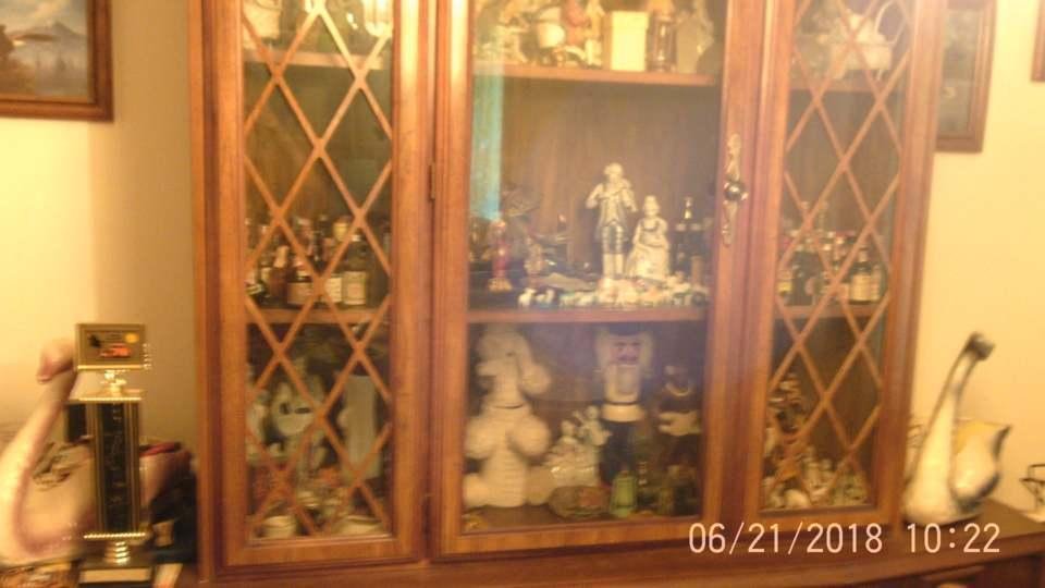 FOR SALE TEAK WOOD CHINA CABINET AND ALSO ALL THE THINGS INSIDE 300.00 FOR CABINET CALL FOR INFO 9108181171